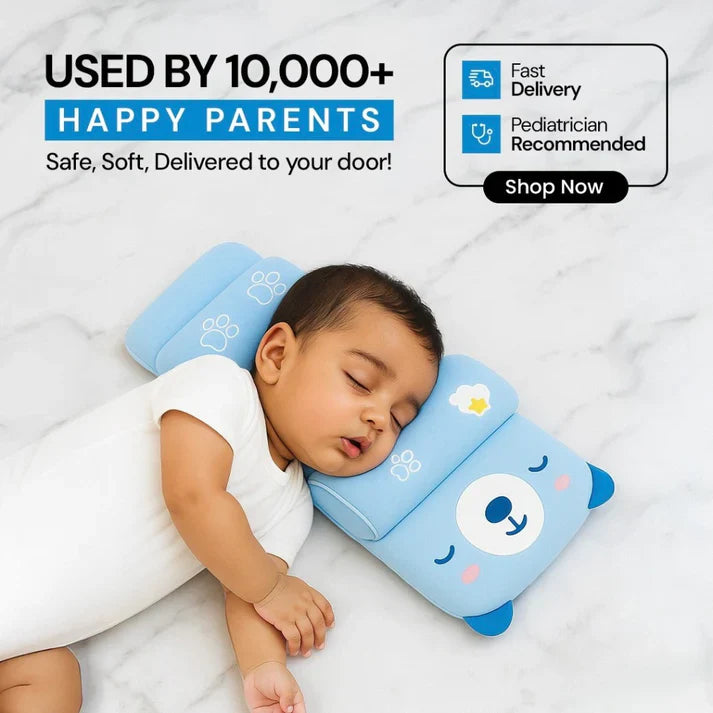 Baby sleeping on a blue pillow with product features highlighted