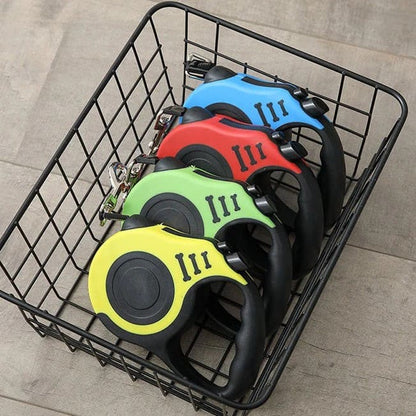 Multicolor retractable pet leash with ergonomic handle and adjustable cord.