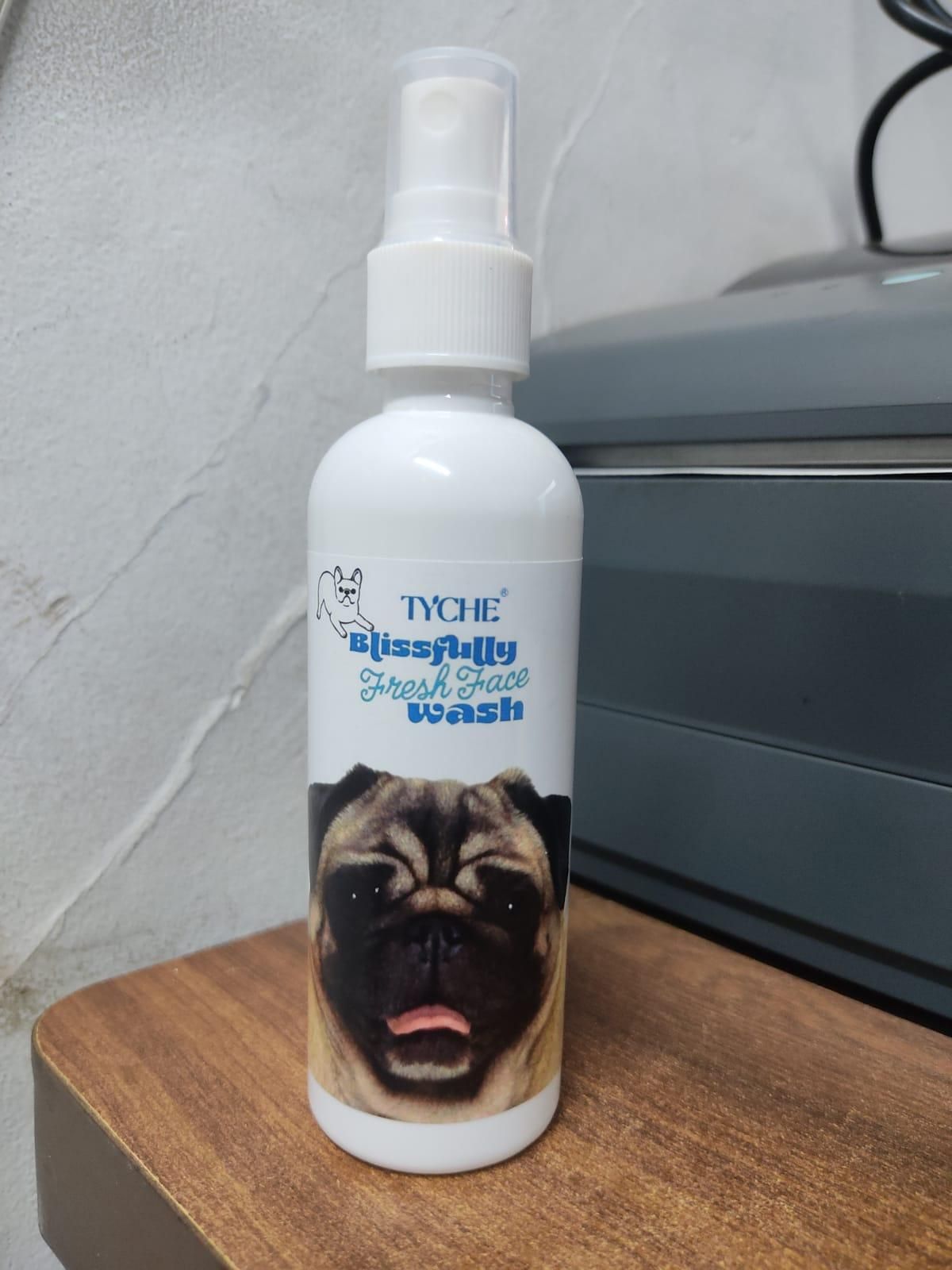 TYCHE Blissfully Flat Facewash in plastic packaging, formulated for gentle facial cleansing, suitable for all skin types, with smooth-flow dispensing bottle.