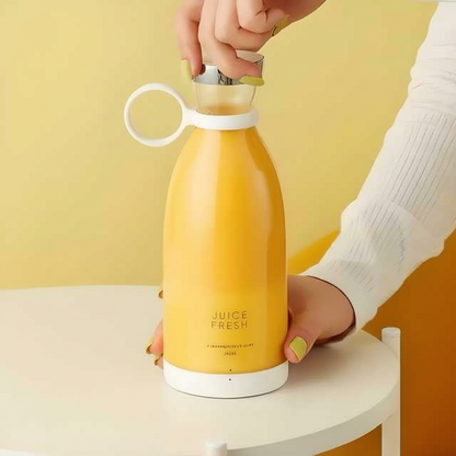 Yellow bottle labeled 'Juice Fresh' held by a person against a yellow background
